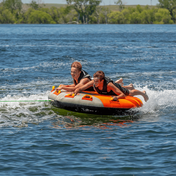 Action View of the Stunt Flyer in the water with two people riding it